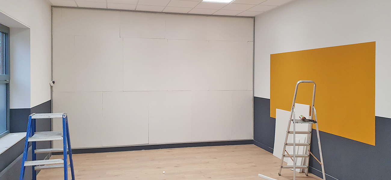 Wandvullend textielframe met akoestische panelen | Wonen Delden